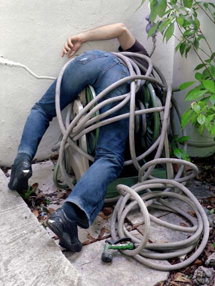 Photographs of People Crammed into Uncomfortable Spaces 