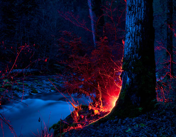 Cold and Dark Landscapes Illuminated by the Red Glow of Emergency Flares takerefuge 10
