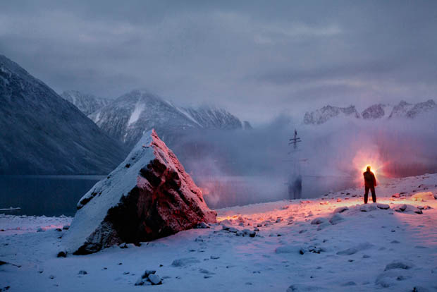 Cold and Dark Landscapes Illuminated by the Red Glow of Emergency Flares takerefuge 3