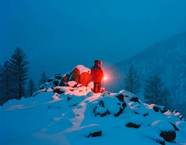 Cold and Dark Landscapes Illuminated by the Red Glow of Emergency Flares takerefuge 6