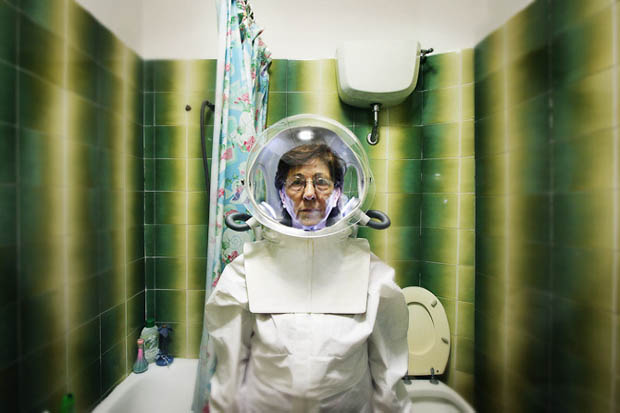 Portraits of People Wearing Space Suits in Not So Alien Locations spacesuit 10